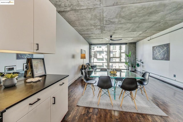 dining space featuring dark hardwood / wood-style floors and ceiling fan