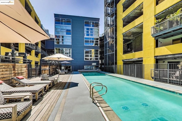 view of swimming pool featuring a patio