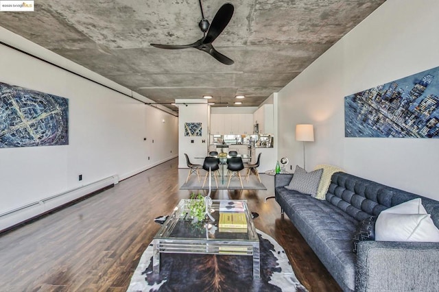 living room featuring ceiling fan and dark hardwood / wood-style floors