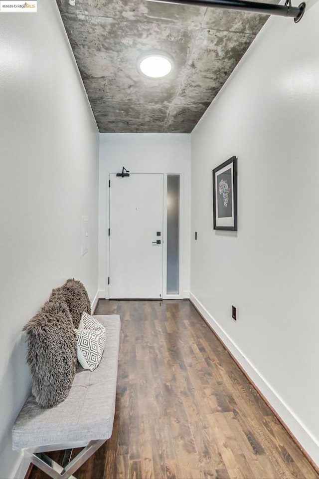 sitting room with hardwood / wood-style floors