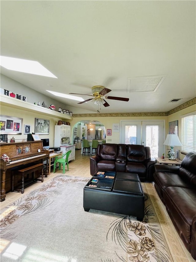 living room featuring ceiling fan