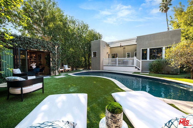 view of swimming pool with a yard, a patio, and a pergola