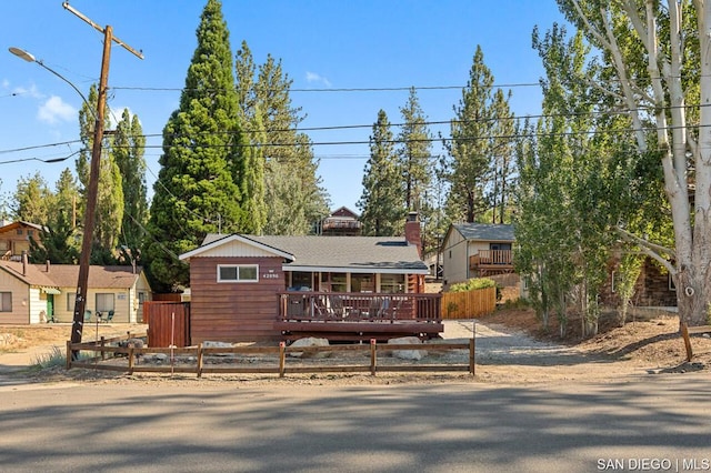 view of front of property with a deck