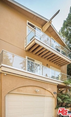 view of home's exterior with a garage