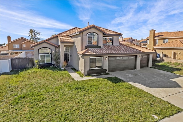 mediterranean / spanish-style house featuring a garage and a front yard