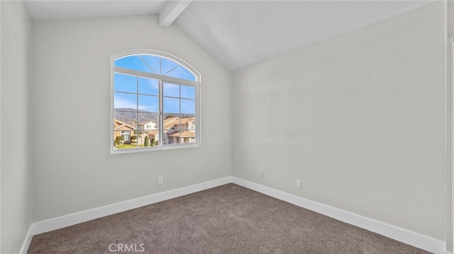 carpeted empty room with vaulted ceiling with beams