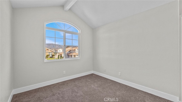 unfurnished room featuring dark colored carpet, lofted ceiling with beams, and baseboards