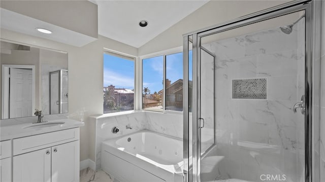 full bath with lofted ceiling, marble finish floor, a marble finish shower, and a whirlpool tub