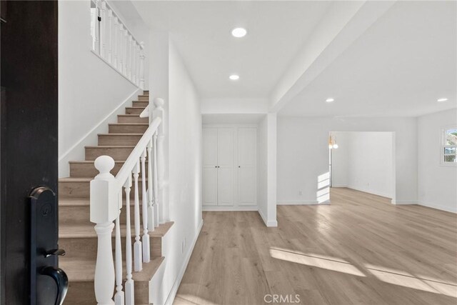 entrance foyer with light hardwood / wood-style floors