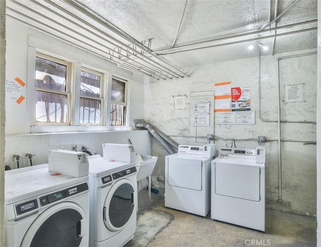 laundry area featuring washer and clothes dryer