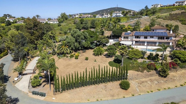 drone / aerial view featuring a mountain view