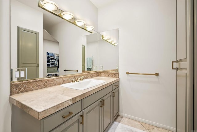 bathroom featuring tile patterned floors and vanity