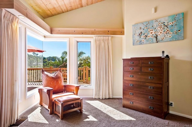 sitting room featuring vaulted ceiling, carpet, a wealth of natural light, and wood ceiling