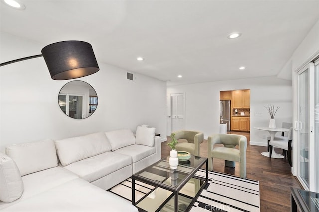 living room featuring recessed lighting, visible vents, dark wood finished floors, and baseboards