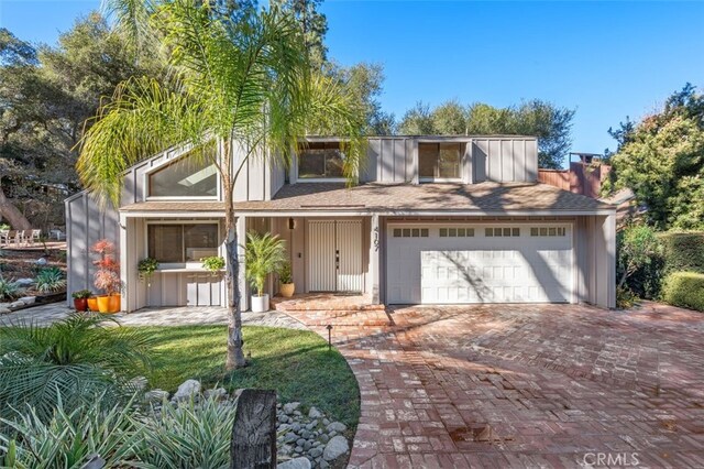 view of front property with a garage