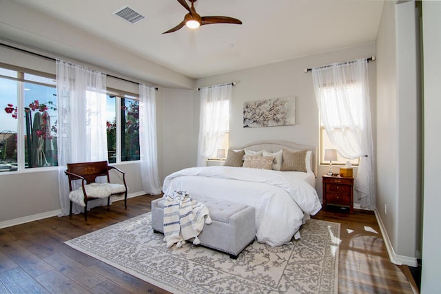 bedroom with hardwood / wood-style flooring and ceiling fan