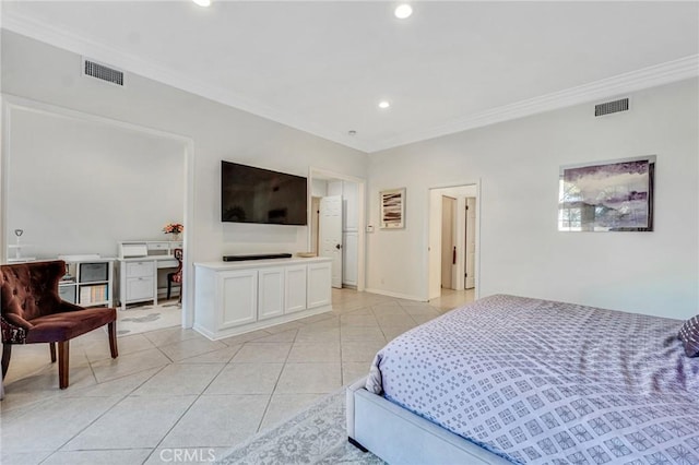 bedroom featuring crown molding and light tile patterned floors