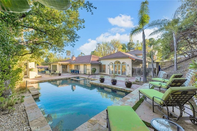 view of pool featuring a patio