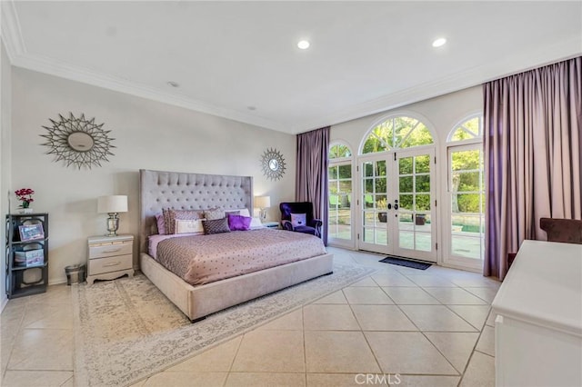 bedroom featuring light tile patterned floors, crown molding, french doors, and access to exterior