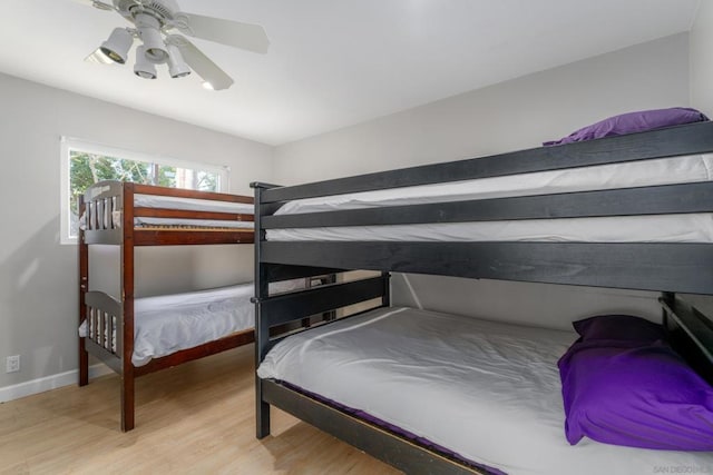 bedroom featuring ceiling fan and light hardwood / wood-style flooring