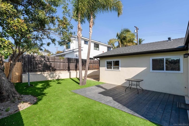 view of yard featuring a wooden deck