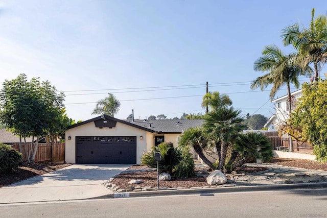 ranch-style home with a garage