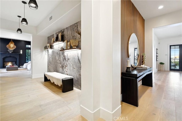 corridor featuring light hardwood / wood-style floors