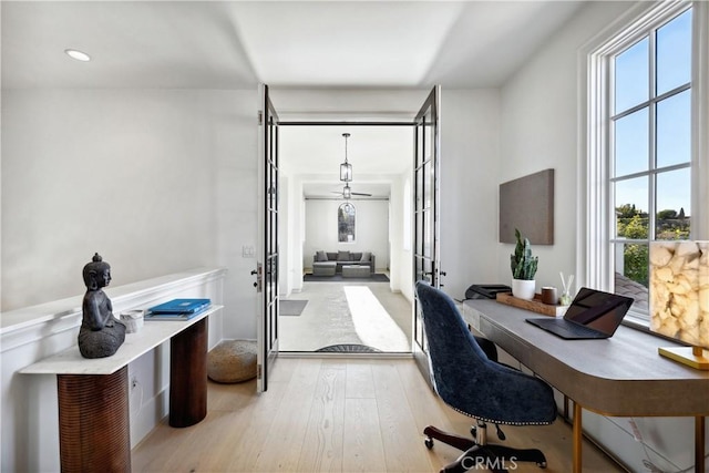 office area featuring light wood-type flooring and french doors