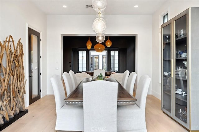 dining room with light hardwood / wood-style floors