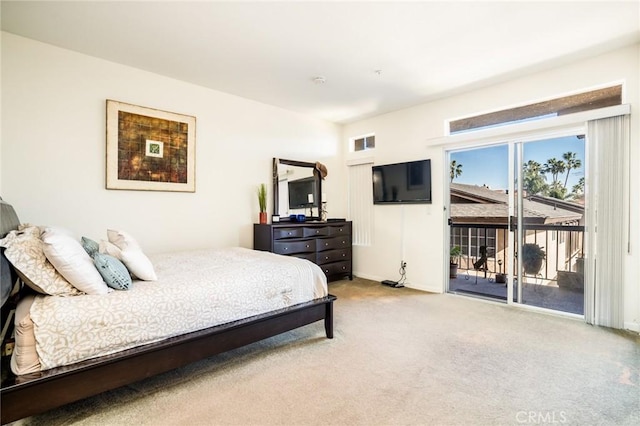 bedroom featuring carpet floors and access to outside