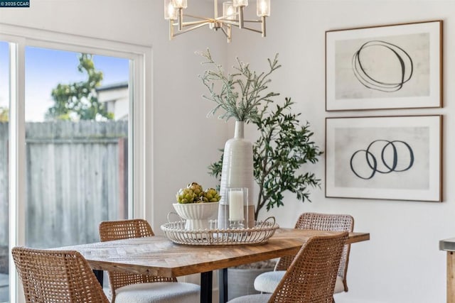 dining area with a notable chandelier