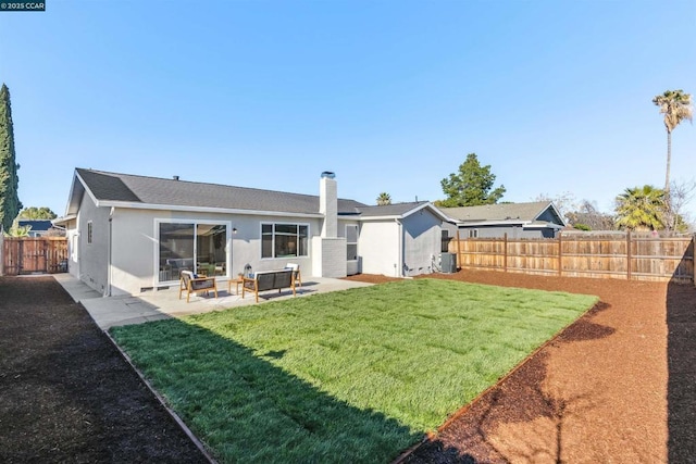 rear view of house featuring a patio, central AC unit, and a lawn