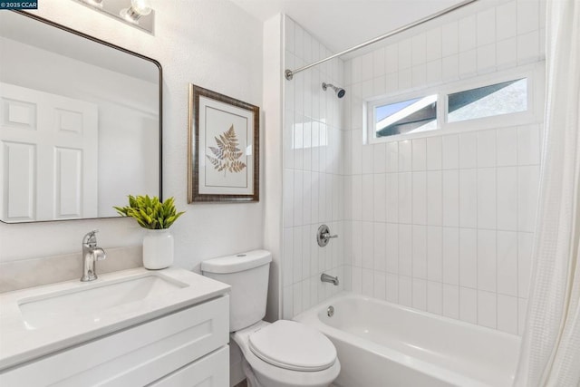 full bathroom featuring vanity, toilet, and shower / tub combo