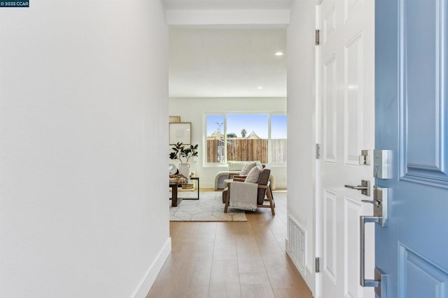 entryway with light wood-type flooring