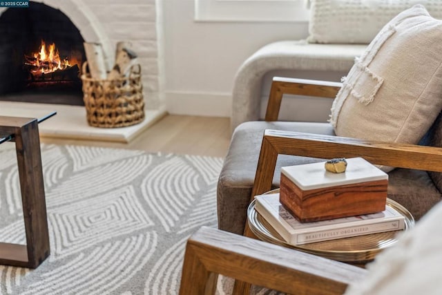 living area with hardwood / wood-style floors