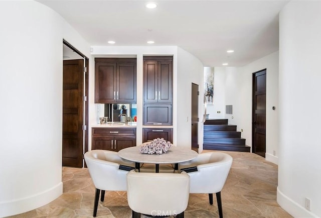 dining area featuring sink