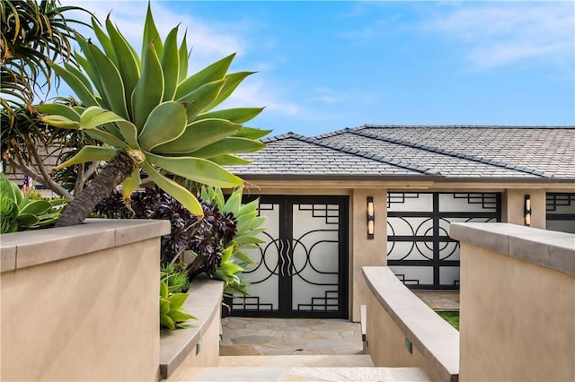 entrance to property featuring a garage