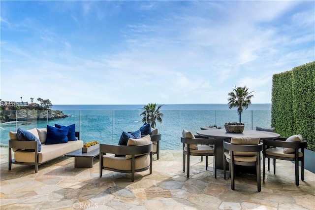 view of patio / terrace featuring a water view