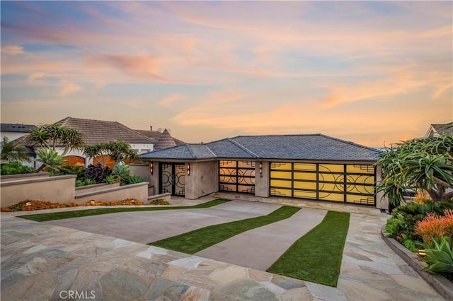 view of front of home with a garage