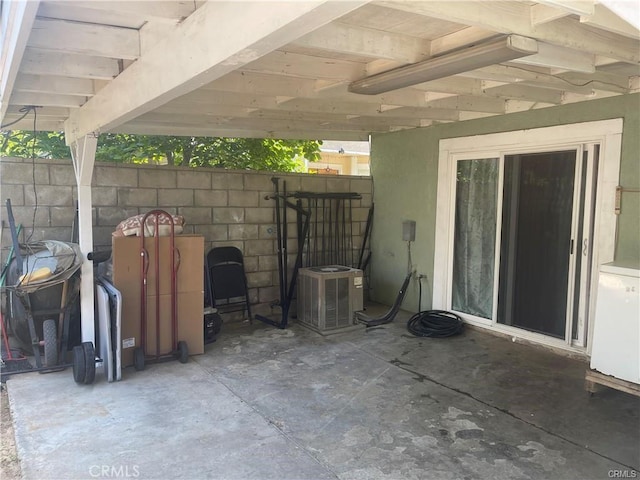 view of patio with central AC unit