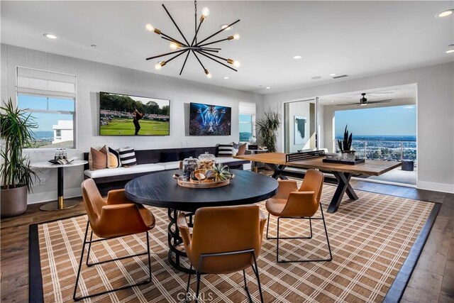 dining room with dark hardwood / wood-style floors