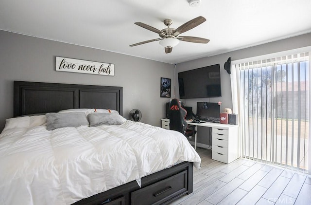 bedroom with ceiling fan and light hardwood / wood-style flooring