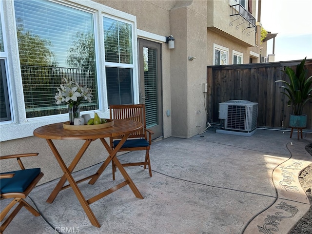 view of patio with central air condition unit