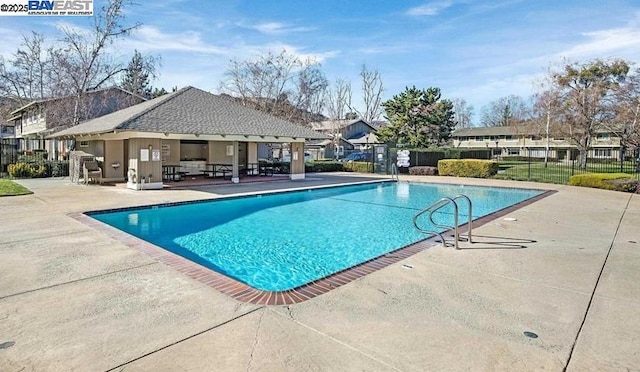 view of pool featuring a patio