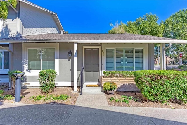 entrance to property with covered porch