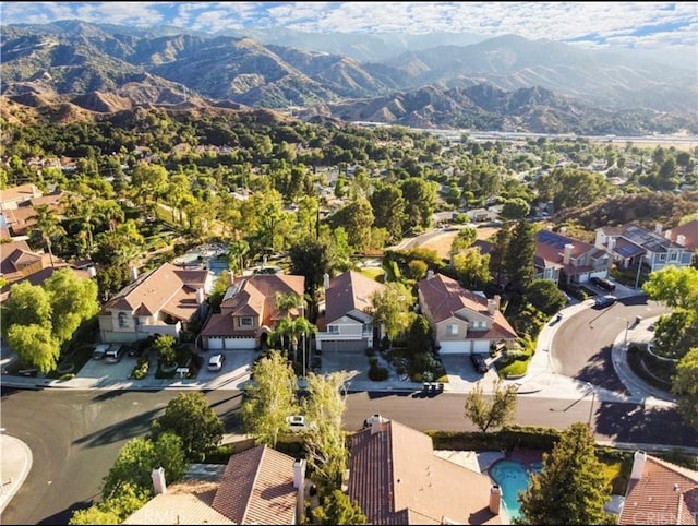 drone / aerial view featuring a mountain view