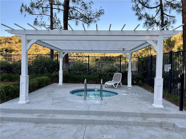 view of pool with a patio area, a community hot tub, and a pergola