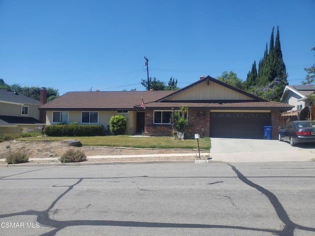 single story home featuring a garage