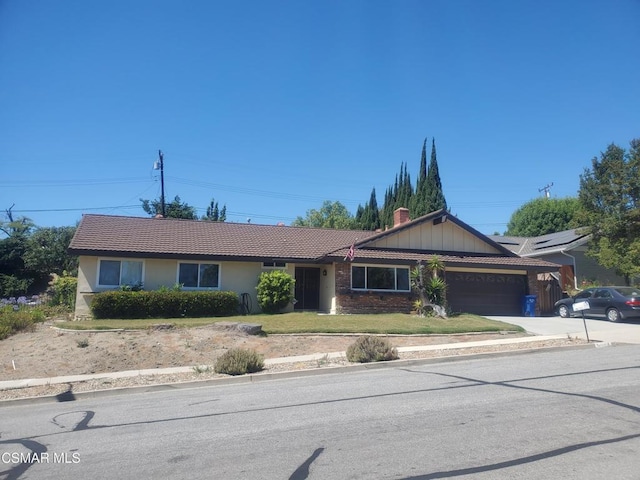 single story home with a garage