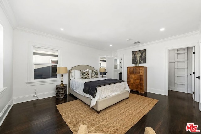 bedroom featuring crown molding and dark hardwood / wood-style flooring